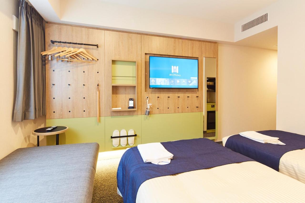 Quarto Deluxe com 2 Camas de Solteiro e Sofá-cama